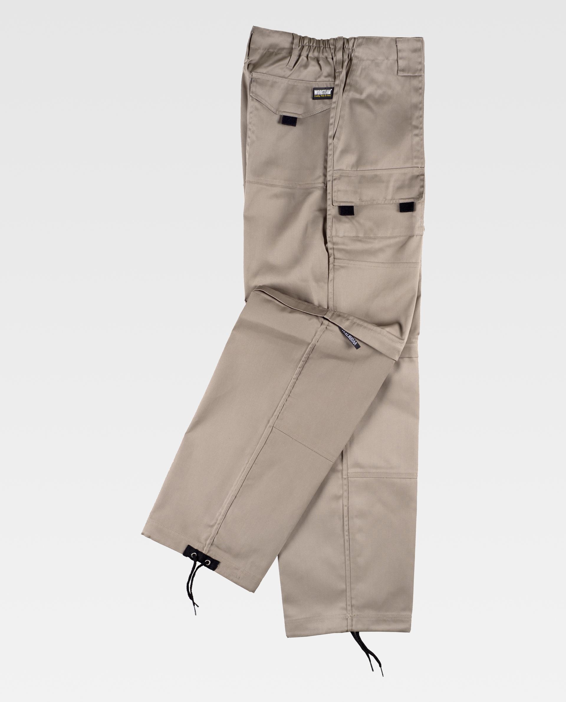 Pantalones de trabajo beige con múltiples bolsillos y cordones ajustables en el bajo