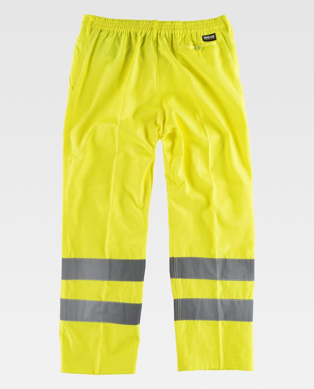 pantalones de trabajo amarillos con bandas reflectantes grises en las piernas