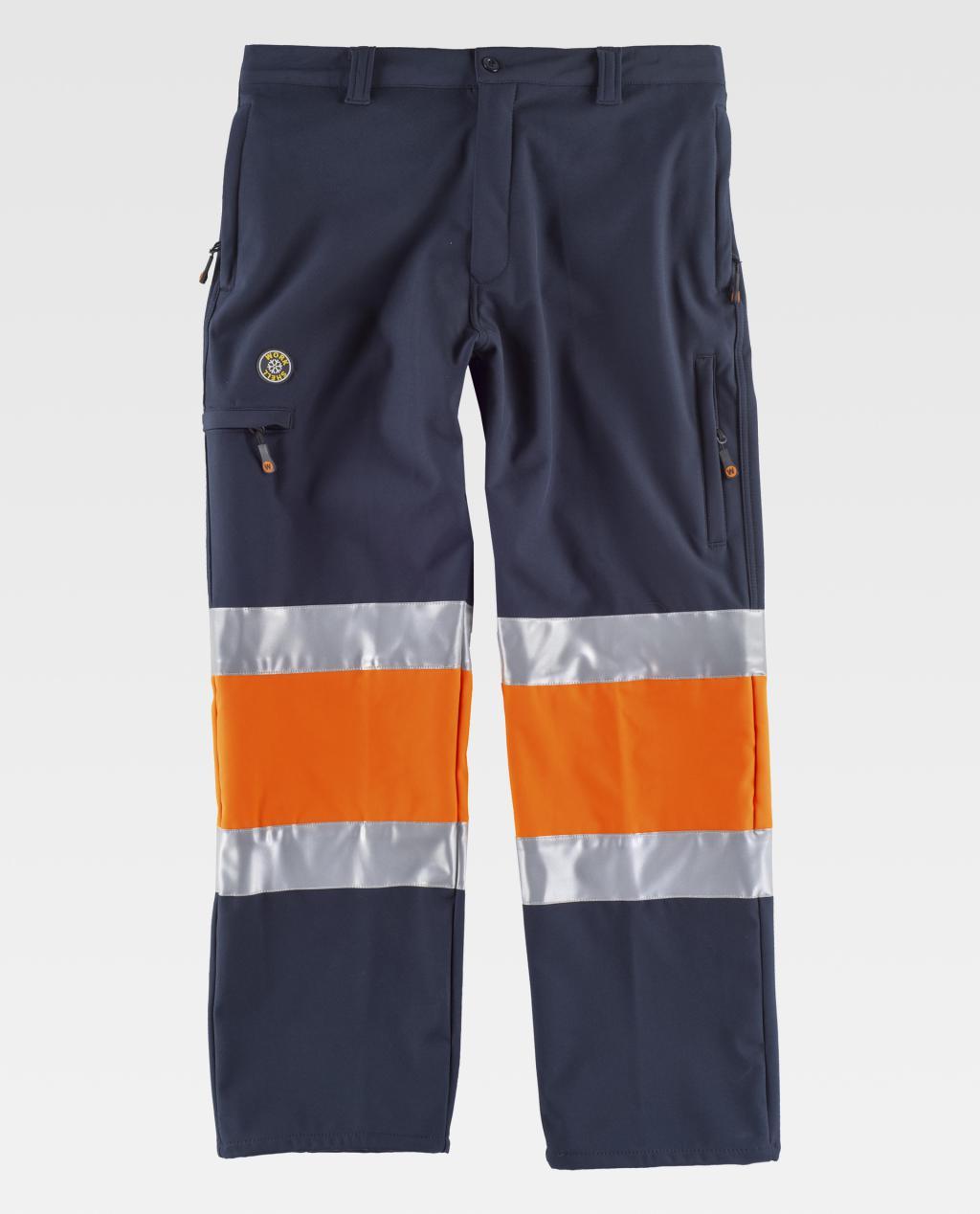 Pantalones de trabajo azul marino con bandas reflectantes plateadas y paneles naranjas en las piernas