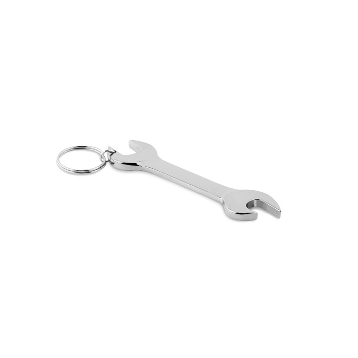 llavero de metal con forma de llave inglesa sobre fondo blanco