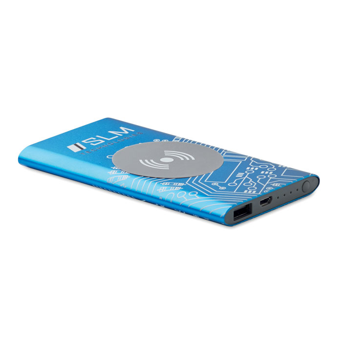 batería externa azul con superficie de carga inalámbrica y puerto USB