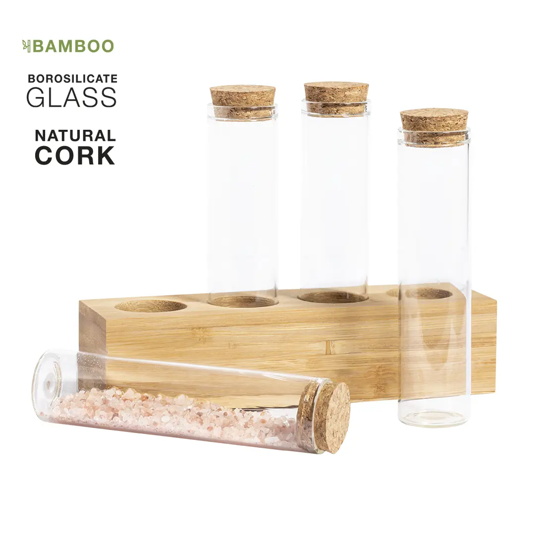 soporte de bambú con tubos de vidrio borosilicato y tapones de corcho, uno contiene sal rosa del Himalaya
