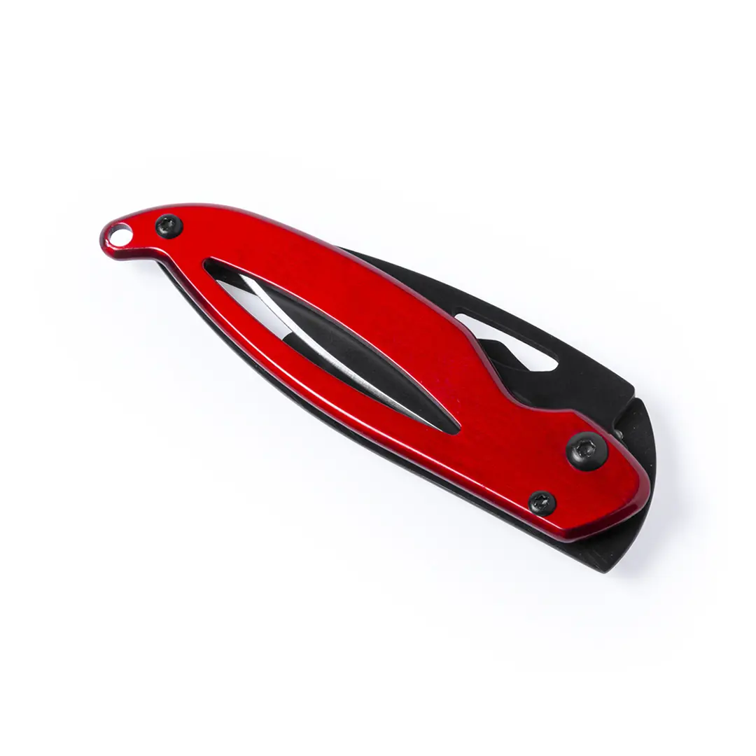 Cúter plegable compacto con mango rojo sobre fondo blanco