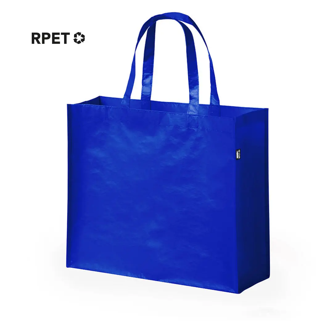 Bolsa reutilizable azul de RPET con asas largas sobre fondo blanco