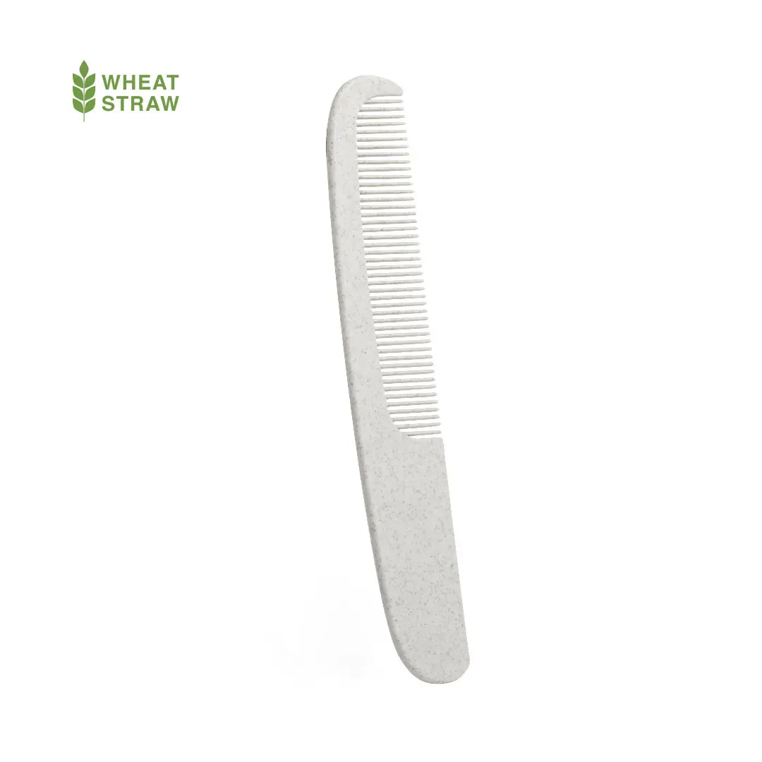 Peine ecológico de paja de trigo en fondo blanco