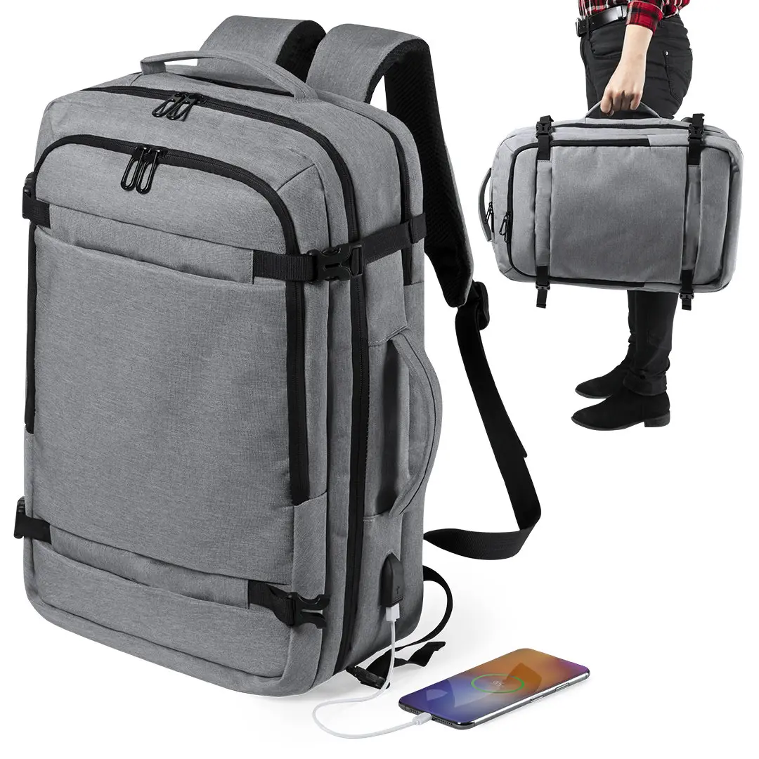 Mochila de viaje gris con múltiples compartimentos y puerto de carga USB integrado, convertible en maletín.