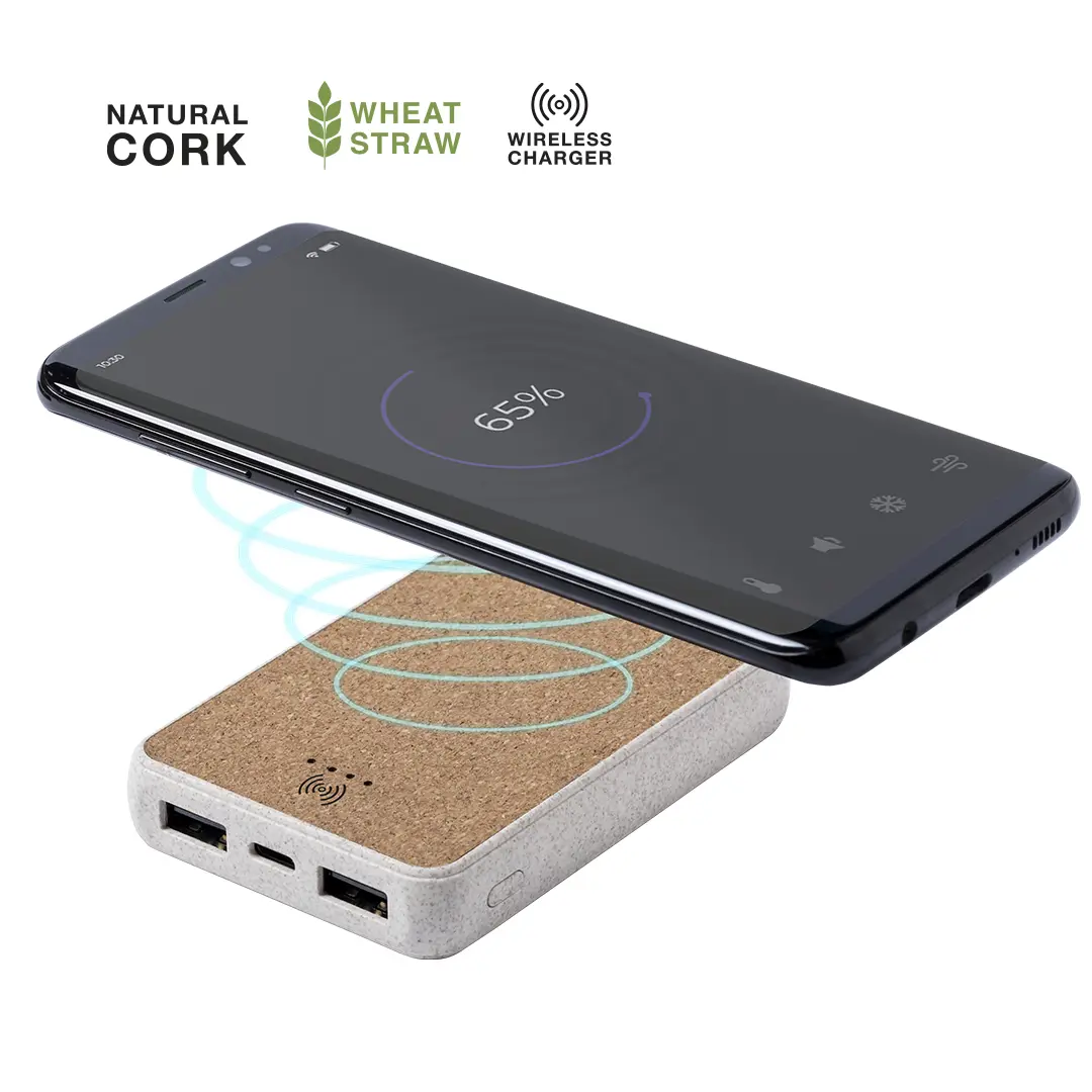 power bank de corcho natural y paja de trigo cargando inalámbricamente un móvil al 65%