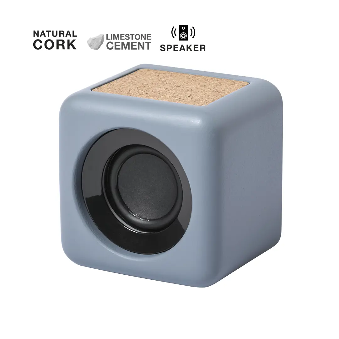 Altavoz de forma cúbica con carcasa de cemento de piedra caliza y superficie superior de corcho natural