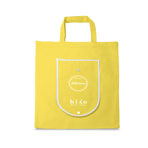 bolsa tote amarilla con bolsillo frontal y logotipo de Hixo Natural Yogurt