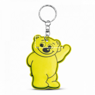 llavero de oso amarillo sonriente con parche en el ojo