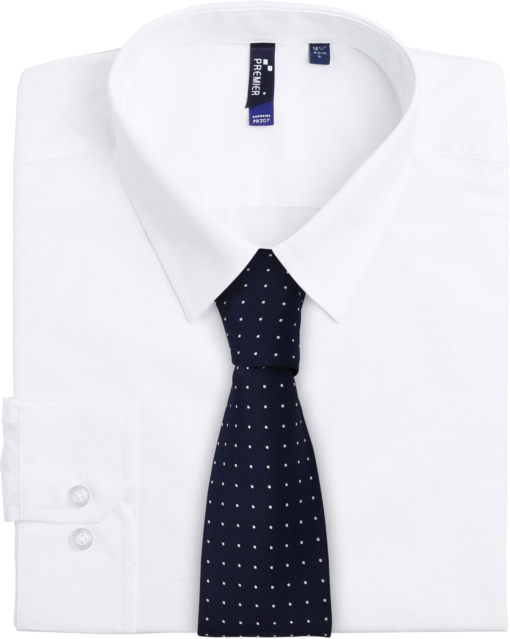 Camisa blanca de vestir doblada con corbata azul marino de pequeños lunares blancos