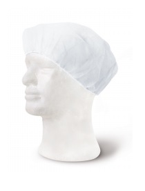 gorro desechable blanco de protección colocado en un maniquí de cabeza