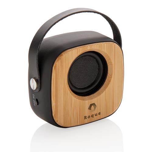 Altavoz portátil de madera y carcasa negra con asa de cuero