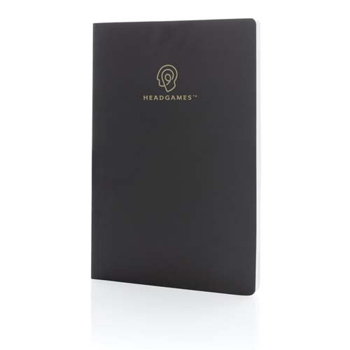Cuaderno negro de tapa blanda con logo dorado Headgames sobre fondo blanco